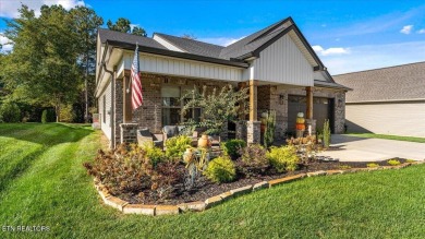 Welcome to 140 Utsesti Way! Discover contemporary elegance and on Toqua Golf Course - Loudon County in Tennessee - for sale on GolfHomes.com, golf home, golf lot