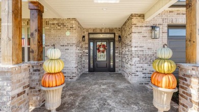 Welcome to 140 Utsesti Way! Discover contemporary elegance and on Toqua Golf Course - Loudon County in Tennessee - for sale on GolfHomes.com, golf home, golf lot
