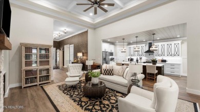 Welcome to 140 Utsesti Way! Discover contemporary elegance and on Toqua Golf Course - Loudon County in Tennessee - for sale on GolfHomes.com, golf home, golf lot