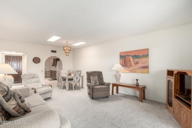 Spacious open-concept living area with stunning mountain views on Canoa Hills Golf Course in Arizona - for sale on GolfHomes.com, golf home, golf lot