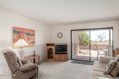 Spacious open-concept living area with stunning mountain views on Canoa Hills Golf Course in Arizona - for sale on GolfHomes.com, golf home, golf lot