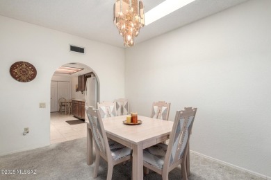 Spacious open-concept living area with stunning mountain views on Canoa Hills Golf Course in Arizona - for sale on GolfHomes.com, golf home, golf lot