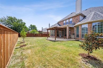 Immerse in the charm of this two-story Lantana Golf Course on Lantana Golf Club in Texas - for sale on GolfHomes.com, golf home, golf lot