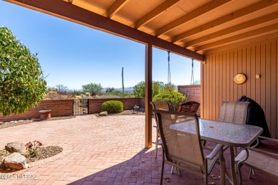 Spacious open-concept living area with stunning mountain views on Canoa Hills Golf Course in Arizona - for sale on GolfHomes.com, golf home, golf lot