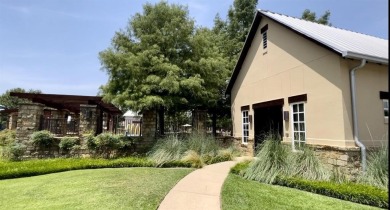 Immerse in the charm of this two-story Lantana Golf Course on Lantana Golf Club in Texas - for sale on GolfHomes.com, golf home, golf lot