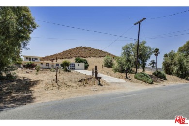 Back on the market as Buyer did not perform. Perched on the hill on Paradise Knolls Golf Course in California - for sale on GolfHomes.com, golf home, golf lot