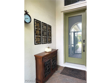 THIS LOVELY HOME IS A MUST SEE TO BELIEVE! This Meticulously on Gateway Golf and Country Club in Florida - for sale on GolfHomes.com, golf home, golf lot