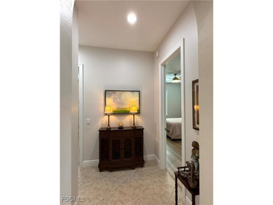 THIS LOVELY HOME IS A MUST SEE TO BELIEVE! This Meticulously on Gateway Golf and Country Club in Florida - for sale on GolfHomes.com, golf home, golf lot