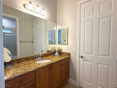 THIS LOVELY HOME IS A MUST SEE TO BELIEVE! This Meticulously on Gateway Golf and Country Club in Florida - for sale on GolfHomes.com, golf home, golf lot