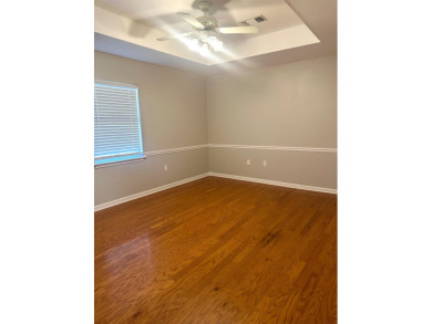 This beautifully, shaded corner lot, is located in a quiet on Bayou Country Club in Louisiana - for sale on GolfHomes.com, golf home, golf lot