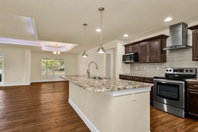 Welcome to this beautifully appointed 3-bedroom, 2-bathroom on Deep Creek Golf Club in Florida - for sale on GolfHomes.com, golf home, golf lot