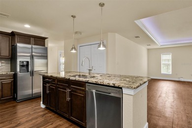 Welcome to this beautifully appointed 3-bedroom, 2-bathroom on Deep Creek Golf Club in Florida - for sale on GolfHomes.com, golf home, golf lot