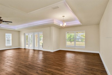 Welcome to this beautifully appointed 3-bedroom, 2-bathroom on Deep Creek Golf Club in Florida - for sale on GolfHomes.com, golf home, golf lot