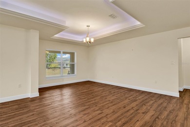 Welcome to this beautifully appointed 3-bedroom, 2-bathroom on Deep Creek Golf Club in Florida - for sale on GolfHomes.com, golf home, golf lot