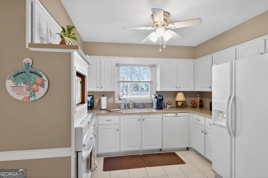 Location is key in this wonderful home overlooking the 10th tee on Forest Heights Country Club in Georgia - for sale on GolfHomes.com, golf home, golf lot