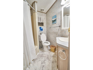 Adorable park model unit. Has been solely a vacation home since on Laurel Valley Golf Course in Tennessee - for sale on GolfHomes.com, golf home, golf lot