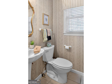 Location is key in this wonderful home overlooking the 10th tee on Forest Heights Country Club in Georgia - for sale on GolfHomes.com, golf home, golf lot