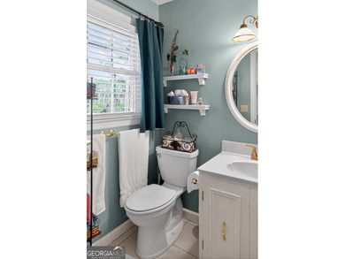 Location is key in this wonderful home overlooking the 10th tee on Forest Heights Country Club in Georgia - for sale on GolfHomes.com, golf home, golf lot