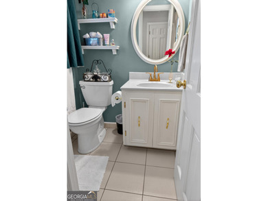 Location is key in this wonderful home overlooking the 10th tee on Forest Heights Country Club in Georgia - for sale on GolfHomes.com, golf home, golf lot