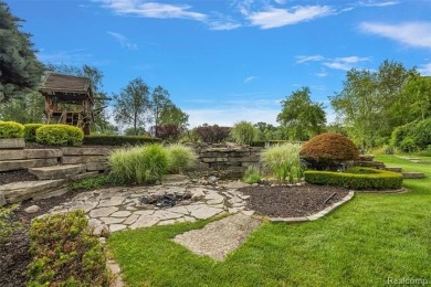 Welcome to 61784 Bunker Hill Drive, an exceptional ranch-style on The Orchards Golf Club in Michigan - for sale on GolfHomes.com, golf home, golf lot