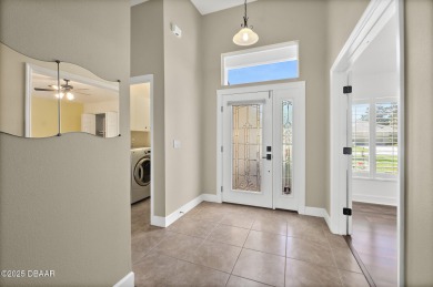 Located within the highly sought-after, guard-gated community of on Plantation Bay Golf and Country Club in Florida - for sale on GolfHomes.com, golf home, golf lot