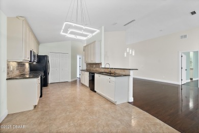 Located within the highly sought-after, guard-gated community of on Plantation Bay Golf and Country Club in Florida - for sale on GolfHomes.com, golf home, golf lot