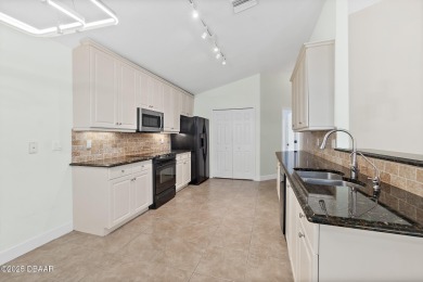 Located within the highly sought-after, guard-gated community of on Plantation Bay Golf and Country Club in Florida - for sale on GolfHomes.com, golf home, golf lot