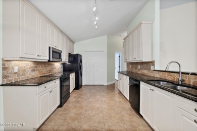 Located within the highly sought-after, guard-gated community of on Plantation Bay Golf and Country Club in Florida - for sale on GolfHomes.com, golf home, golf lot