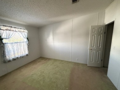 ***This home is located within a 55+ resort style leased land on Big Cypress Golf and Country Club in Florida - for sale on GolfHomes.com, golf home, golf lot