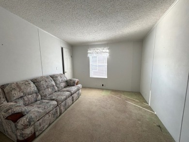 ***This home is located within a 55+ resort style leased land on Big Cypress Golf and Country Club in Florida - for sale on GolfHomes.com, golf home, golf lot