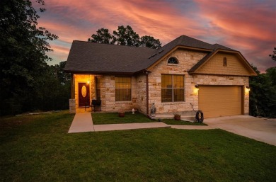 This immaculate custom home, consisting of 3 lots totaling on Pine Forest Golf Club in Texas - for sale on GolfHomes.com, golf home, golf lot