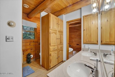 LAKEFRONT LOG DREAM HOME!  Real authentic log home nestled on on Forest Lake Club in Pennsylvania - for sale on GolfHomes.com, golf home, golf lot