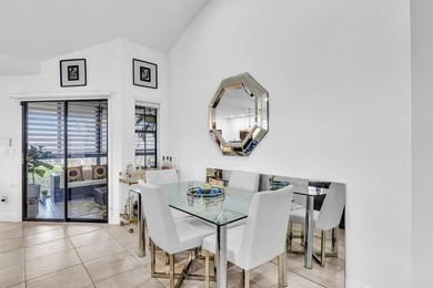 Welcome to this exceptionally remodeled second floor corner on Boca Pointe Country Club in Florida - for sale on GolfHomes.com, golf home, golf lot