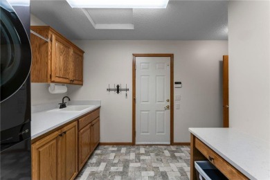 Absolutely amazing one-level living in The Wilds Golf Course on The Wilds Golf Club in Minnesota - for sale on GolfHomes.com, golf home, golf lot