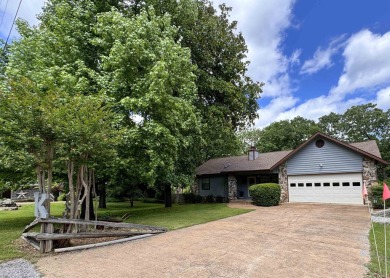 A great location overlooking the South Fork River next to the on Cherokee Village North Course in Arkansas - for sale on GolfHomes.com, golf home, golf lot