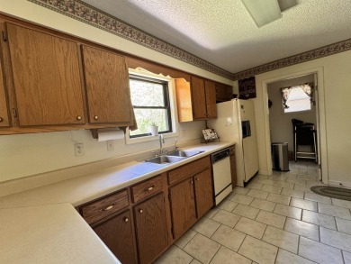 A great location overlooking the South Fork River next to the on Cherokee Village North Course in Arkansas - for sale on GolfHomes.com, golf home, golf lot