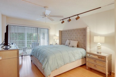 STOP SEARCHING! YOU FOUND THIS SPARKLING UPDATED CORNER CONDO on Poinciana Golf Club in Florida - for sale on GolfHomes.com, golf home, golf lot
