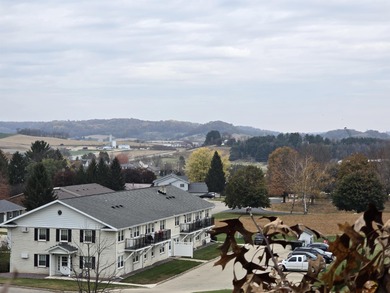 Vacant lot in desirable peaceful subdivision, short walk from on West Brook Hills Golf Course in Wisconsin - for sale on GolfHomes.com, golf home, golf lot