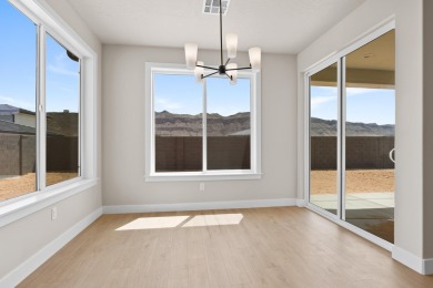 4 Car Garage, 2x6 exterior walls, fireplace with built-ins on Copper Rock Golf Course in Utah - for sale on GolfHomes.com, golf home, golf lot