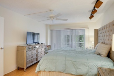 STOP SEARCHING! YOU FOUND THIS SPARKLING UPDATED CORNER CONDO on Poinciana Golf Club in Florida - for sale on GolfHomes.com, golf home, golf lot