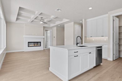 4 Car Garage, 2x6 exterior walls, fireplace with built-ins on Copper Rock Golf Course in Utah - for sale on GolfHomes.com, golf home, golf lot