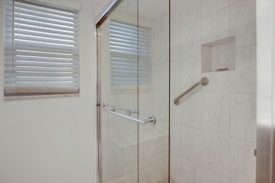 STOP SEARCHING! YOU FOUND THIS SPARKLING UPDATED CORNER CONDO on Poinciana Golf Club in Florida - for sale on GolfHomes.com, golf home, golf lot