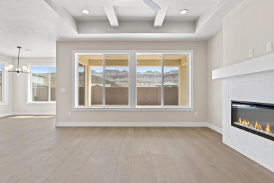 4 Car Garage, 2x6 exterior walls, fireplace with built-ins on Copper Rock Golf Course in Utah - for sale on GolfHomes.com, golf home, golf lot