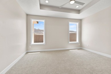 4 Car Garage, 2x6 exterior walls, fireplace with built-ins on Copper Rock Golf Course in Utah - for sale on GolfHomes.com, golf home, golf lot