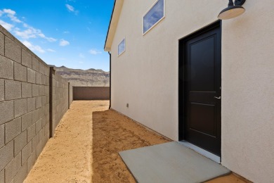 4 Car Garage, 2x6 exterior walls, fireplace with built-ins on Copper Rock Golf Course in Utah - for sale on GolfHomes.com, golf home, golf lot