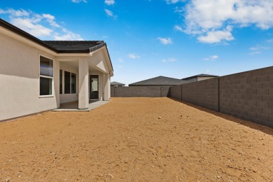 4 Car Garage, 2x6 exterior walls, fireplace with built-ins on Copper Rock Golf Course in Utah - for sale on GolfHomes.com, golf home, golf lot