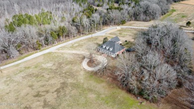 Welcome to this elegant 6-bedroom, 4.5-bathroom home with a on Colonial Country Club Deerfield in Mississippi - for sale on GolfHomes.com, golf home, golf lot