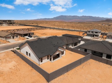4 Car Garage, 2x6 exterior walls, fireplace with built-ins on Copper Rock Golf Course in Utah - for sale on GolfHomes.com, golf home, golf lot