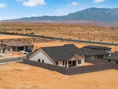 4 Car Garage, 2x6 exterior walls, fireplace with built-ins on Copper Rock Golf Course in Utah - for sale on GolfHomes.com, golf home, golf lot