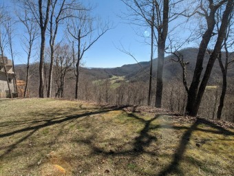 Lovely, southern facing lot with beautiful mountain views on Smoky Mountain Country Club in North Carolina - for sale on GolfHomes.com, golf home, golf lot